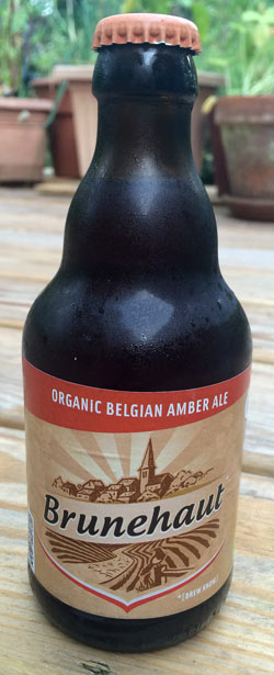 bottle of cold Brunehaut Belgian Organic Amber beer