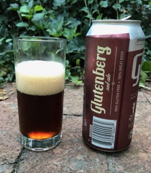 Pour of Glutenberg Red Ale gluten-free beer, in a glass with can